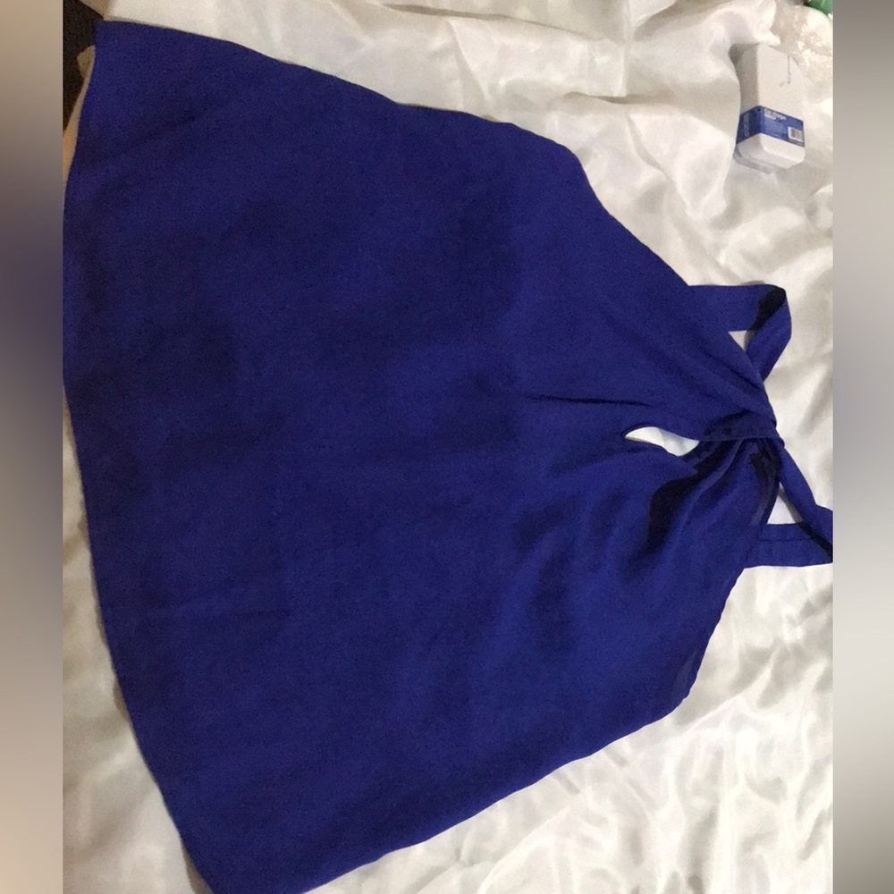 Cute blue crossways shirt with open back very breezy and comfy